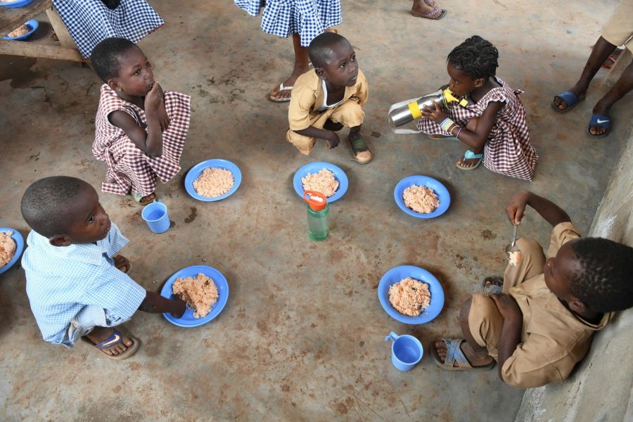 Children eating vitamin-enriched food.