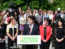 Justin Trudeau standing at podium.