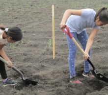 young girls gardening 