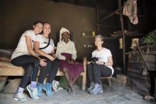 wateraid volunteers with a local woman 
