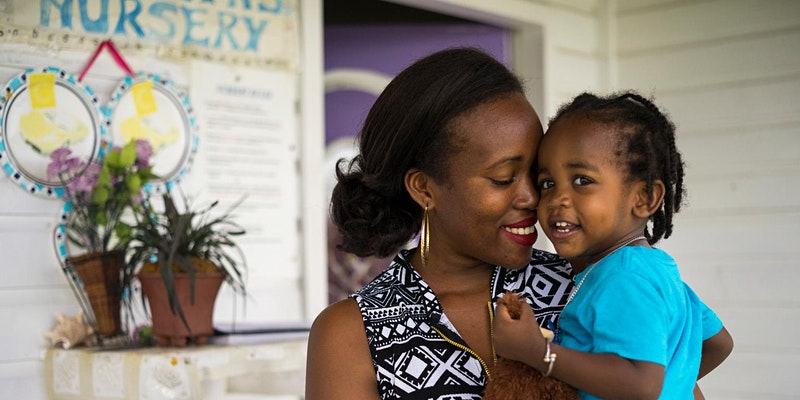 mother holding child